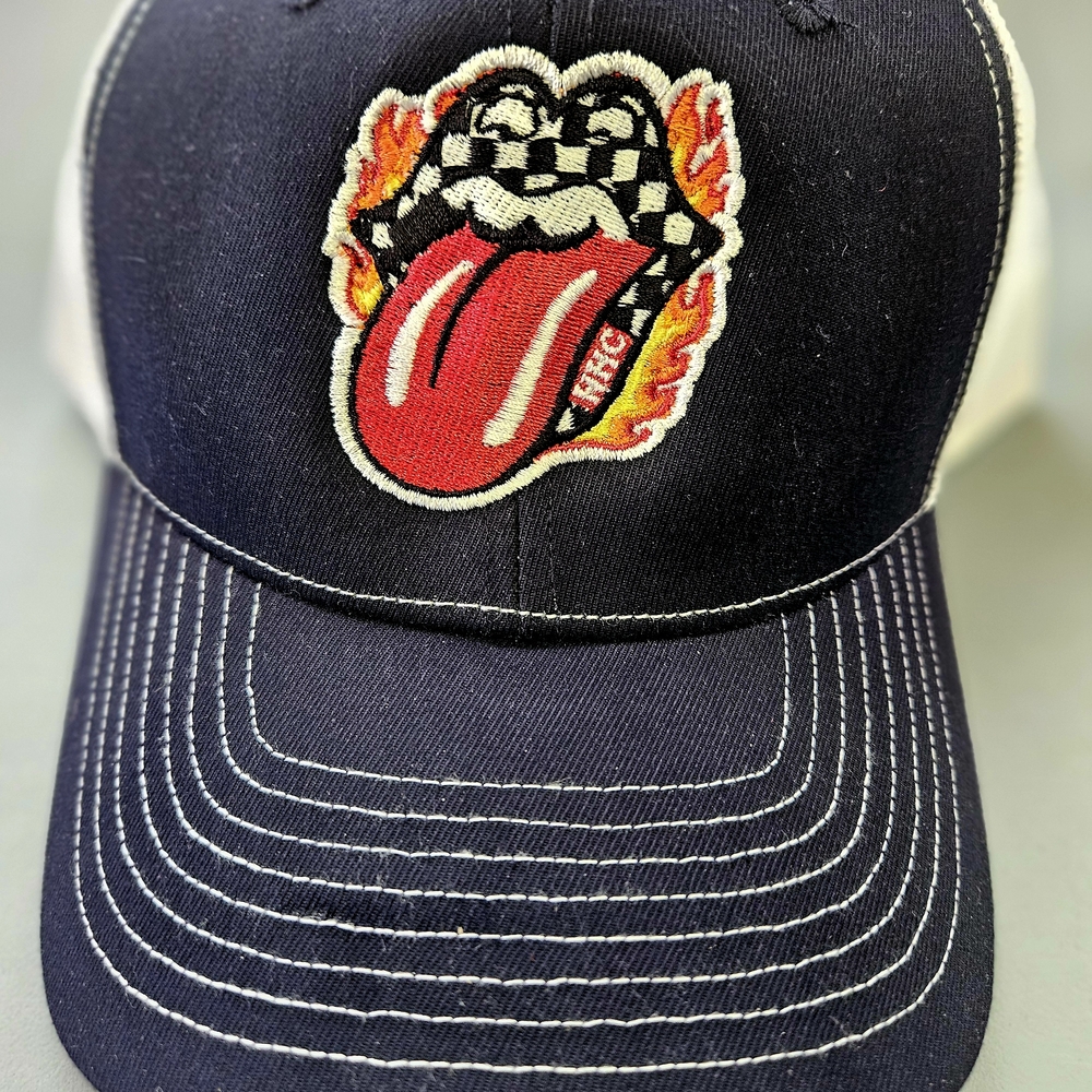 Navy and White Cap with Vheckered Lips.  Red Tongue Patch